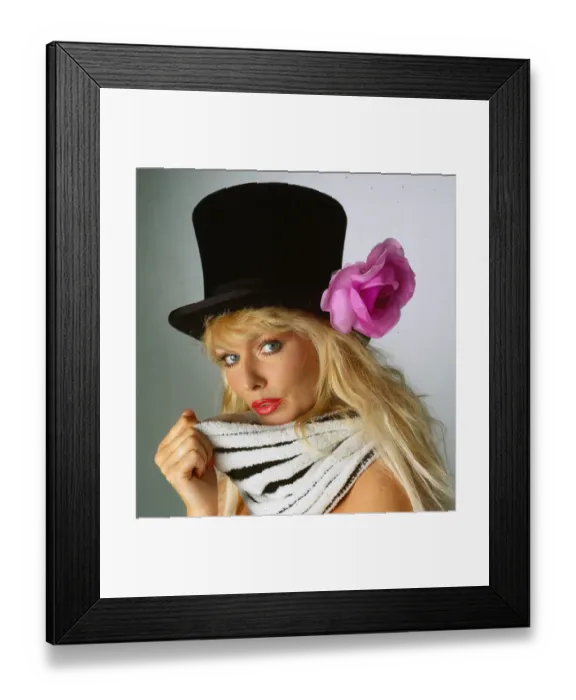 Framed Print : Hat Fashion model wears black top hat with lilac flower April 1990