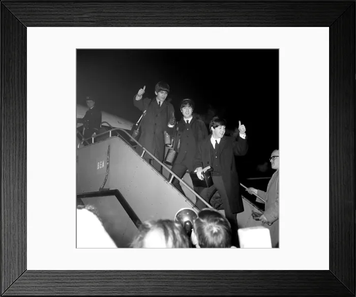 Framed Print : Beatles left to right: George Harrison, John Lennon and Paul McCartney boarding the plane Framed Print : Beatles left to right: George Harrison, John Lennon and Paul McCartney boarding the plane