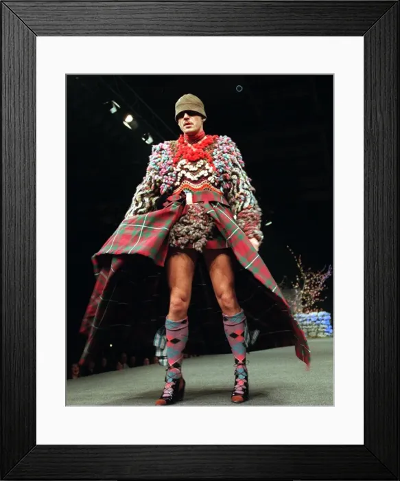 Framed Print : male tartan model on catwalk at westwood show Framed Print : male tartan model on catwalk at westwood show