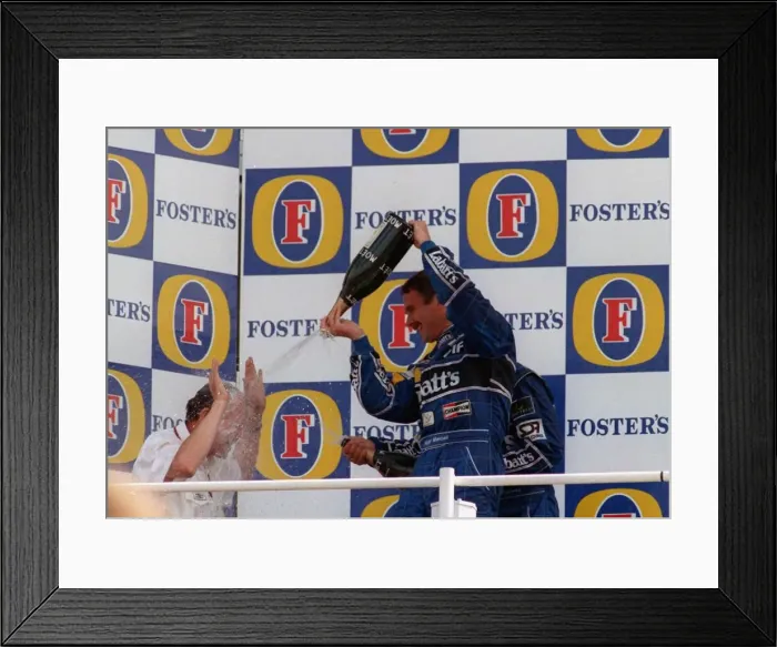 Framed Print : Nigel Mansell winning the British Grand Prix July 1992 Celebrating spraying other