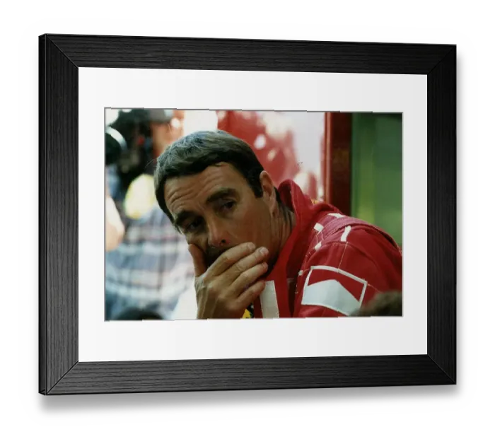 Framed Print : Nigel Mansell Motor Racing Grand Prix Formula One Driver sits with resting his head in