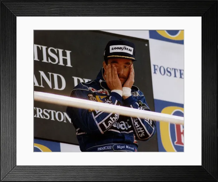 Framed Print : Nigel Mansell Motor Racing Grand Prix Formula One Driver standing on the winners podium