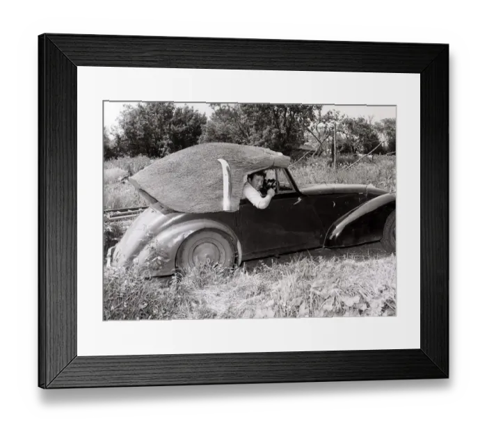 Framed Print : John Porter, a thatcher by trade, has made a thatched roof for his 1949 Allard which he Framed Print : John Porter, a thatcher by trade, has made a thatched roof for his 1949 Allard which he