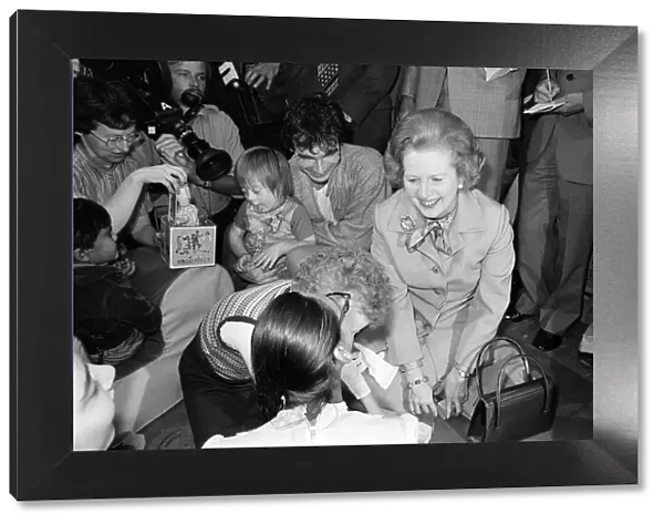 Margaret Thatcher visits Toynbee Hall in the East End with children July 1980