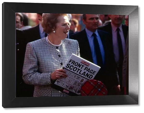 Margaret Thatcher with copy of Daily Record book March 1988