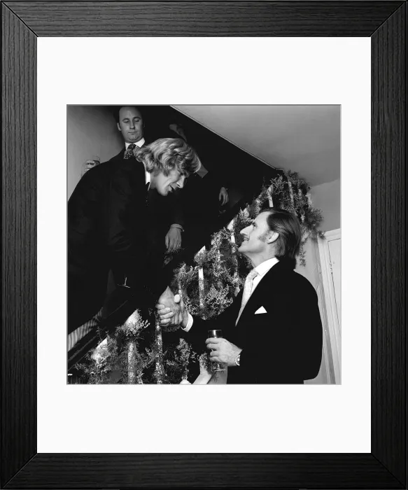Framed Print : Motor racing driver James Hunt shakes hands with 1974 Graham Hill on his wedding Framed Print : Motor racing driver James Hunt shakes hands with 1974 Graham Hill on his wedding