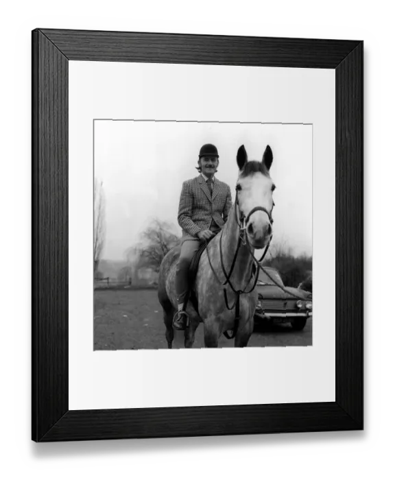 Framed Print : Racing driver Graham Hill on horse at home 1970 Framed Print : Racing driver Graham Hill on horse at home 1970