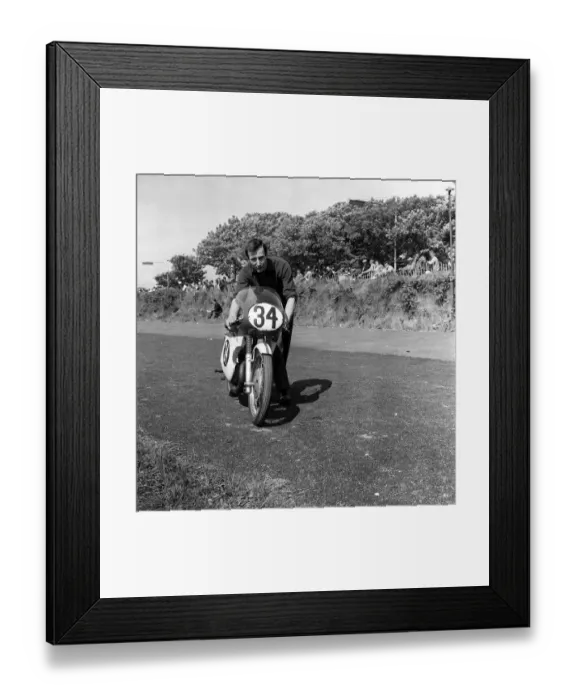 Framed Print : Isle of Man TT (Tourist Trophy) June 1962 Mike Hawthorne pushing motorbike Framed Print : Isle of Man TT (Tourist Trophy) June 1962 Mike Hawthorne pushing motorbike