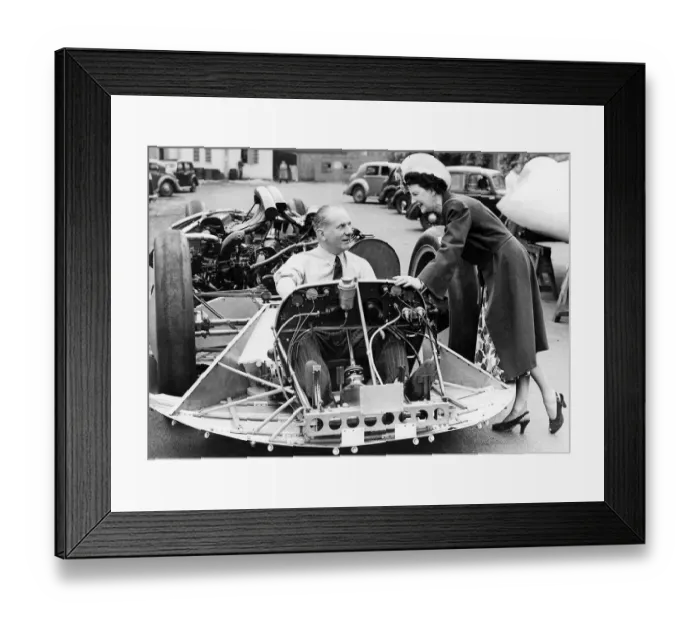 Framed Print : John Cobb June 1947 seated in the chassis of his railton Mobil special talks with