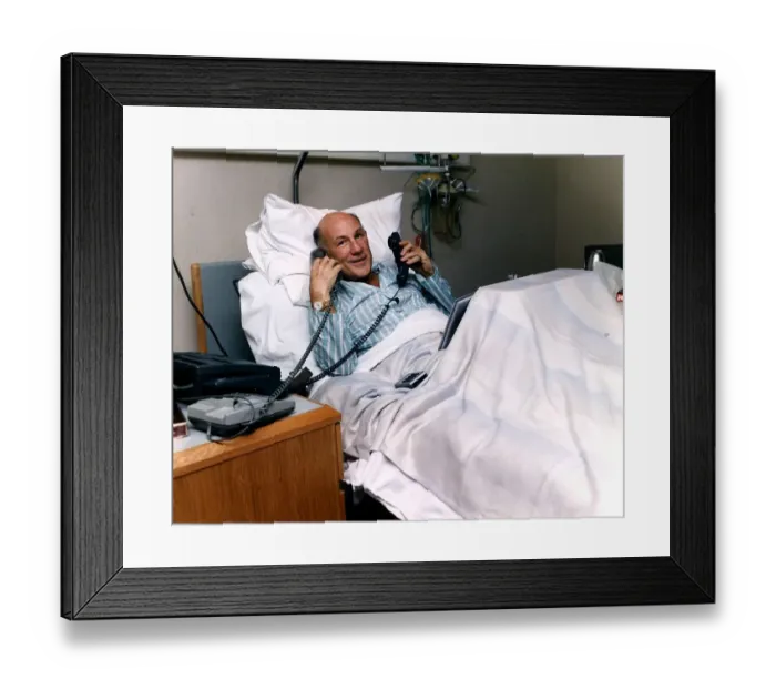 Framed Print : Stirling Moss Former Motor Racing Driver in Hospital after being involved in a collision