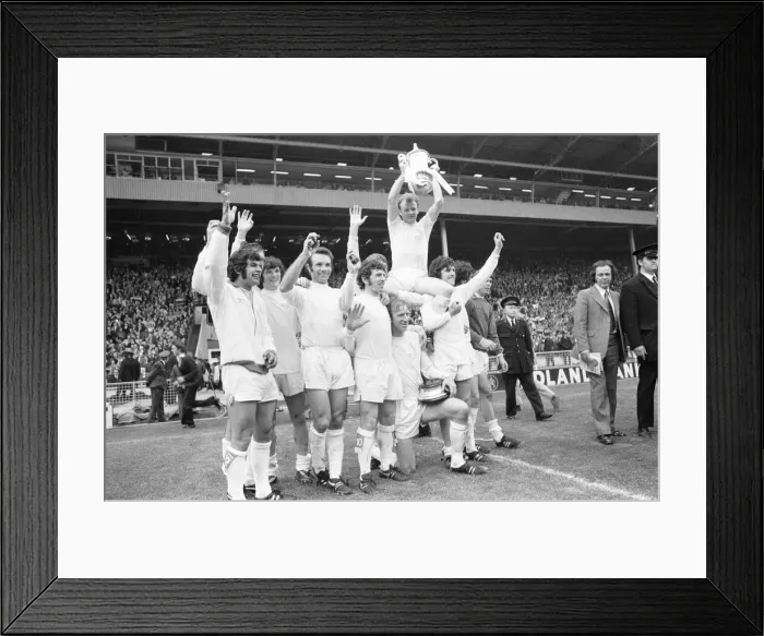 Framed Print : Billy Bremner Leeds United captain is lifted by his team mates with the F. A Framed Print : Billy Bremner Leeds United captain is lifted by his team mates with the F. A
