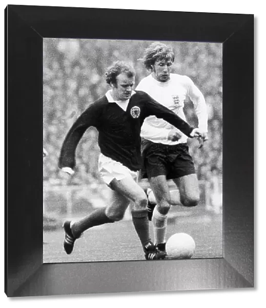 Billy Bremner and Colin Bell clash during the home international between England