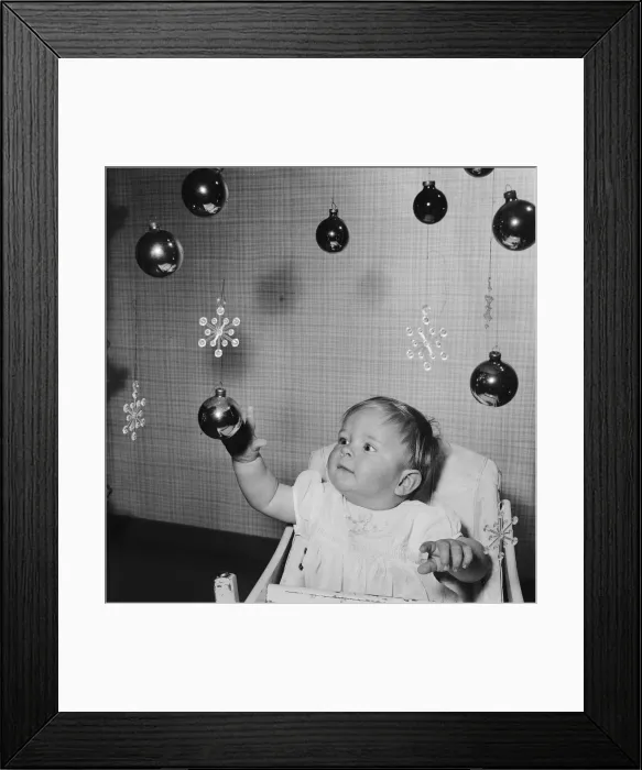 Framed Print : 10 month old vavy boy Christopher Trayhorn of Stevenage New Town playing with hanging Framed Print : 10 month old vavy boy Christopher Trayhorn of Stevenage New Town playing with hanging
