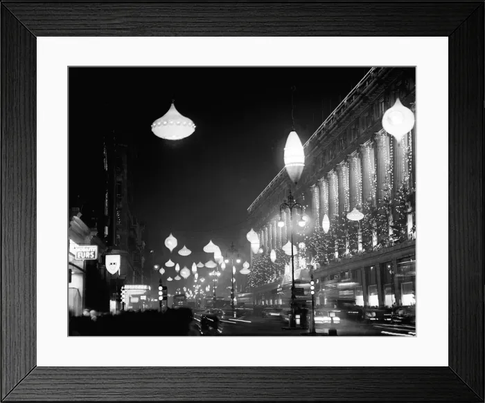 Framed Print : Giant size baubles and beads in the form of illuminated Christmas decorations alight Framed Print : Giant size baubles and beads in the form of illuminated Christmas decorations alight