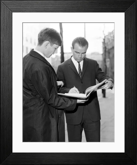 Framed Print : Australia in England 1964. Australian Captain Bobby Simpson signs an autograph Framed Print : Australia in England 1964. Australian Captain Bobby Simpson signs an autograph