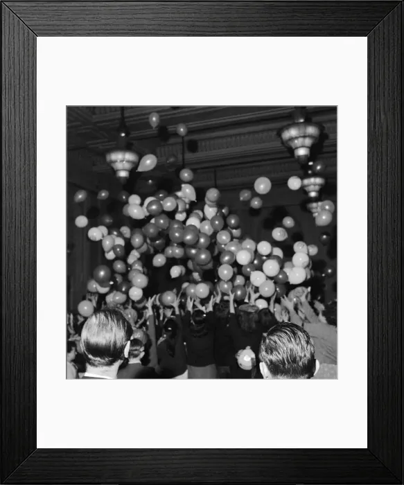 Framed Print : Balloons being released at a childrens party in Soho, London. December 1956 Framed Print : Balloons being released at a childrens party in Soho, London. December 1956