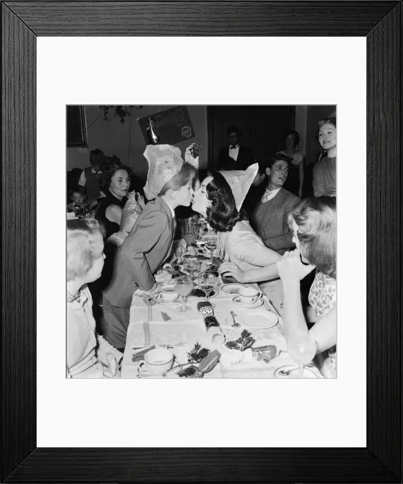 Framed Print : Boy actor Richard Williams kisses actress Anne Heywood on the lips underneath