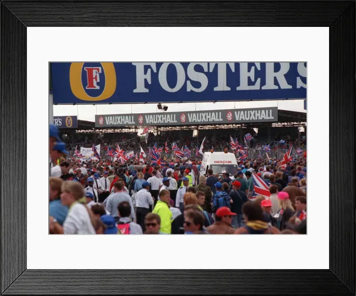 Framed Print : A large crowd celebrating July 1992 after Nigel Mansell had won the British Grand Framed Print : A large crowd celebrating July 1992 after Nigel Mansell had won the British Grand