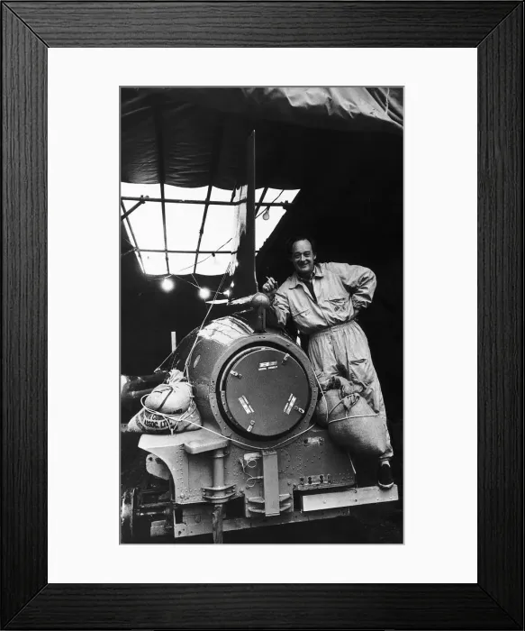Framed Print : Donald Campbell World speed record on land and water standing beside the boat bluebird Framed Print : Donald Campbell World speed record on land and water standing beside the boat bluebird