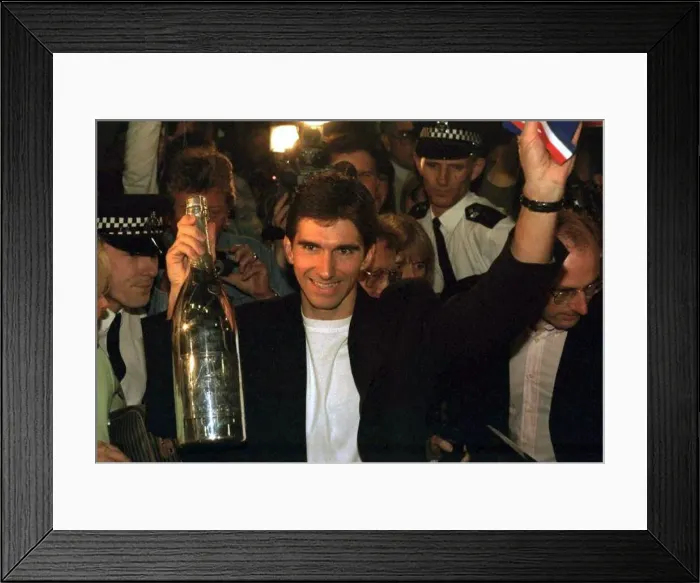 Framed Print : Damon Hill Arrives At Heathrow With His Wife Georgie After His Winning The Formula One Framed Print : Damon Hill Arrives At Heathrow With His Wife Georgie After His Winning The Formula One