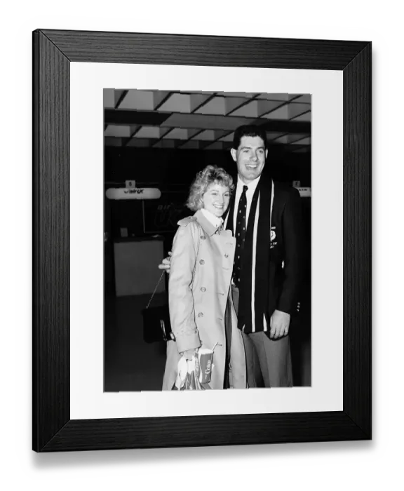Framed Print : Gavin Hastings rugby player and wife girlfriend standing arm around at airport