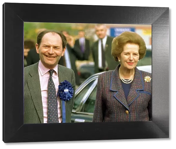 Michael Forsyth MP wearing blue rosette pink shirt patterned tie with Lady Margaret
