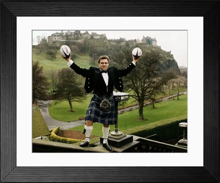 Framed Print : Scotland and Bath Rugby Union player David Hilton wearing kilt standing on wall holding Framed Print : Scotland and Bath Rugby Union player David Hilton wearing kilt standing on wall holding