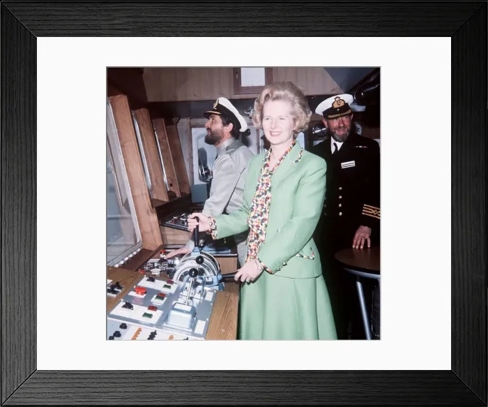 Framed Print : Margaret Thatcher on board Star Taurus ship green suit holding controls