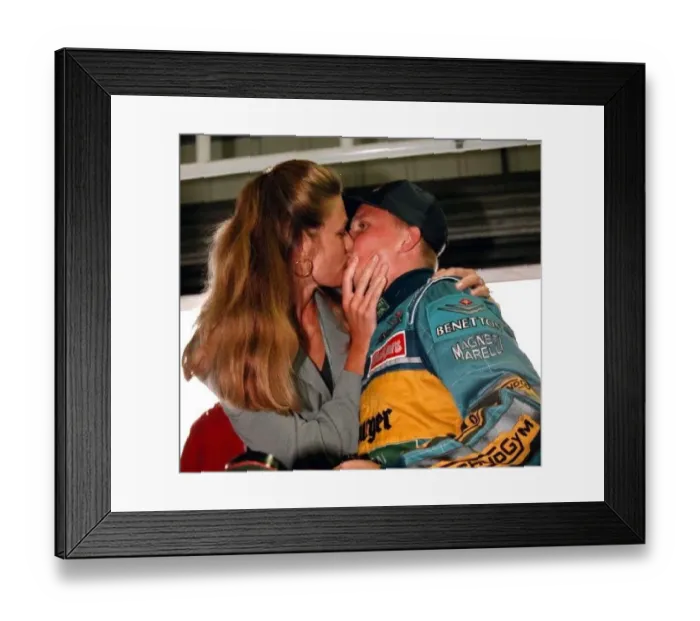 : Johnny Herbert kissies his wife Rebecca after winning the british Grand Prix 1995 : Johnny Herbert kissies his wife Rebecca after winning the british Grand Prix 1995