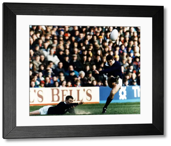 Framed Print : Scotland rugby skipper Gavin Hastings kicking ball in air which was held in place by Framed Print : Scotland rugby skipper Gavin Hastings kicking ball in air which was held in place by