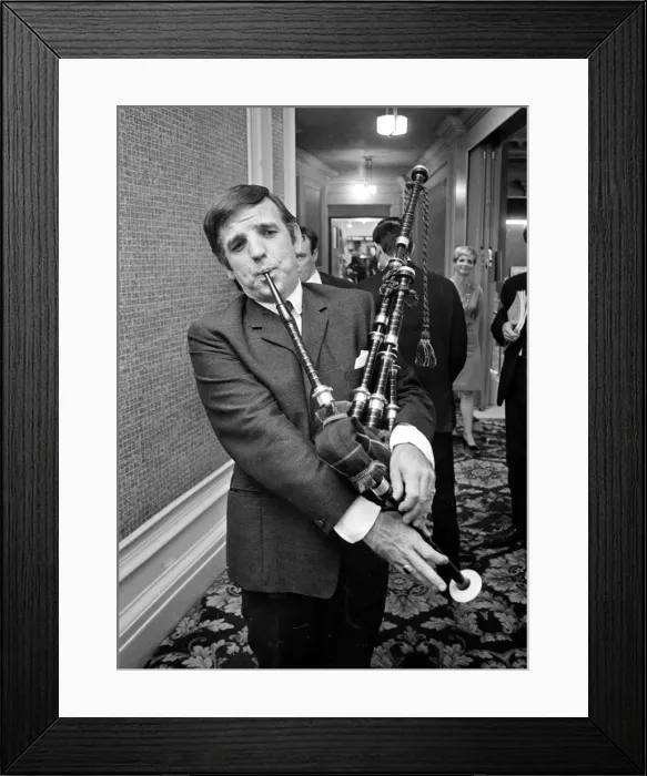 Framed Print : Radio DJ Alan Freeman playing the bagpipes 22nd August 1966 Neg Framed Print : Radio DJ Alan Freeman playing the bagpipes 22nd August 1966 Neg