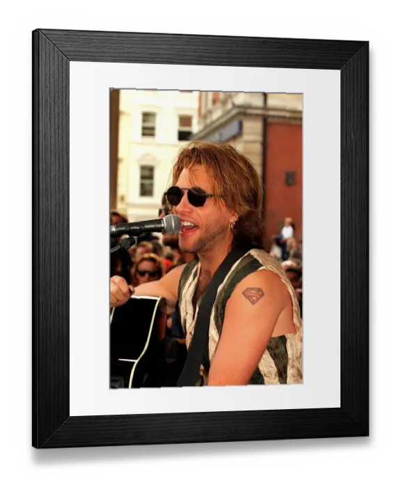 Framed Print : Jon Bon Jovi pop star busking in Covent Garden crowds Playing the guitar