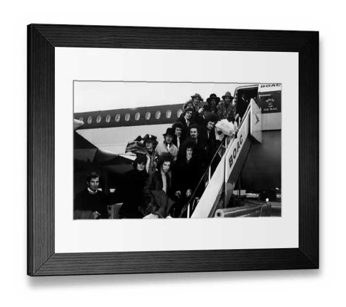 Framed Print : Pop groups including The Jimi Hendrix Experience and The Byrds standing outside aeroplane Framed Print : Pop groups including The Jimi Hendrix Experience and The Byrds standing outside aeroplane