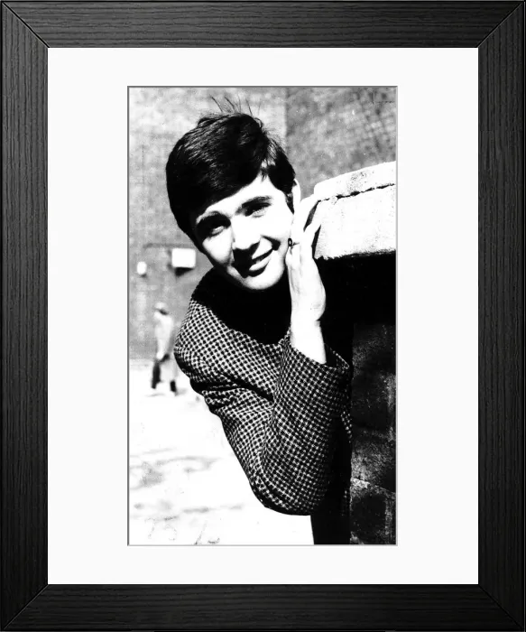 Framed Print : David Essex Singer looking round wall Framed Print : David Essex Singer looking round wall