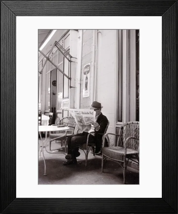Framed Print : A gentleman reads the paper in a Marsaille street cafe Framed Print : A gentleman reads the paper in a Marsaille street cafe