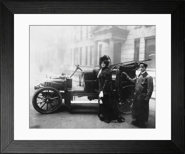 Framed Print : Woman and her chauffeur in the early 1900s Framed Print : Woman and her chauffeur in the early 1900s