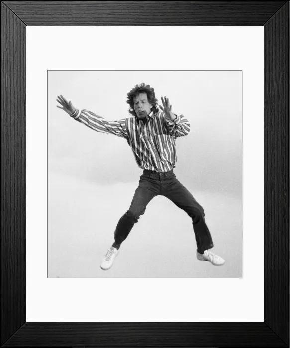 Framed Print : Rolling Stones: Mick Jagger on the roof of the Daily Mirror building in Holborn