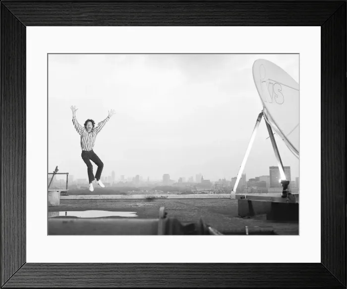 Framed Print : Rolling Stones: Mick Jagger on the roof of the Daily Mirror building in Holborn Framed Print : Rolling Stones: Mick Jagger on the roof of the Daily Mirror building in Holborn