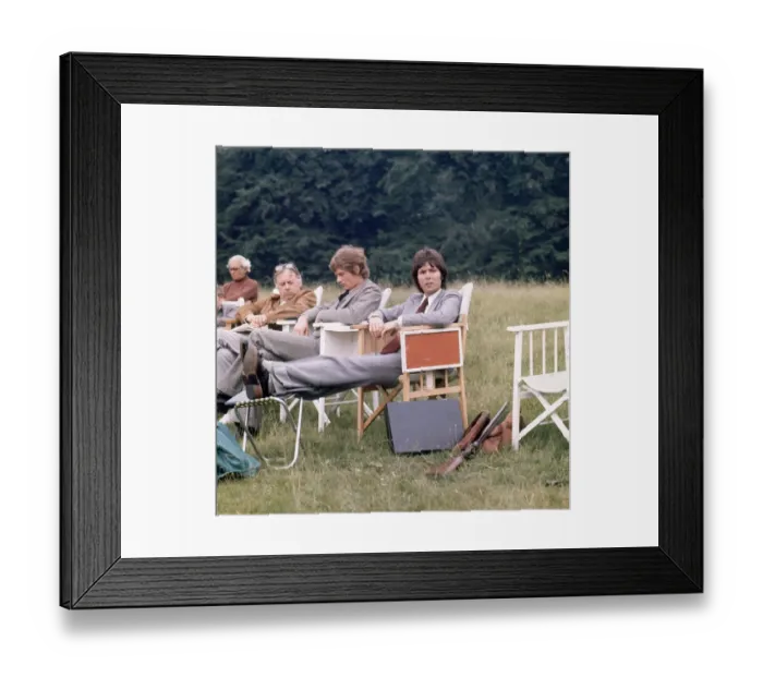 Framed Print : Cliff Richard and Anthony Andrews seen here relaxing between takes on location filming Framed Print : Cliff Richard and Anthony Andrews seen here relaxing between takes on location filming