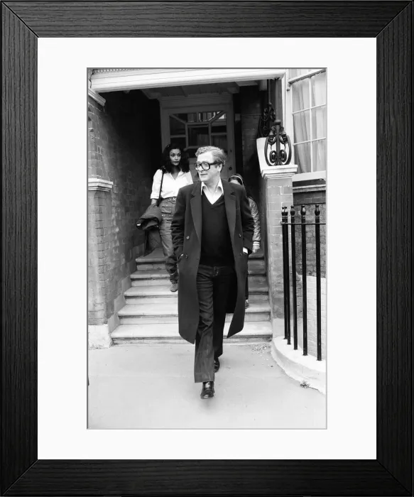 Framed Print : Actor Michael Caine with his wife Shakira makes a 20 minute visit to Elizabeth Taylor Framed Print : Actor Michael Caine with his wife Shakira makes a 20 minute visit to Elizabeth Taylor