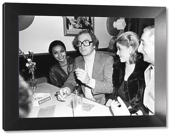 Actor Michael Caine with his wife Shakira photographed at boxer John Conteh