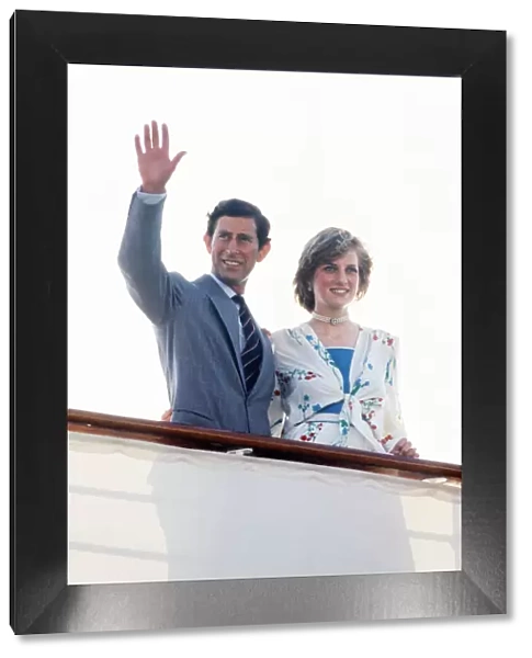 Prince Charles and Princess Diana standing together on board the Royal yacht Britannia in