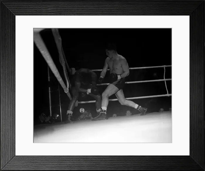 Framed Print : Don Cockell corners american Lloyd Marshall at Earls Court London-Marshall was later