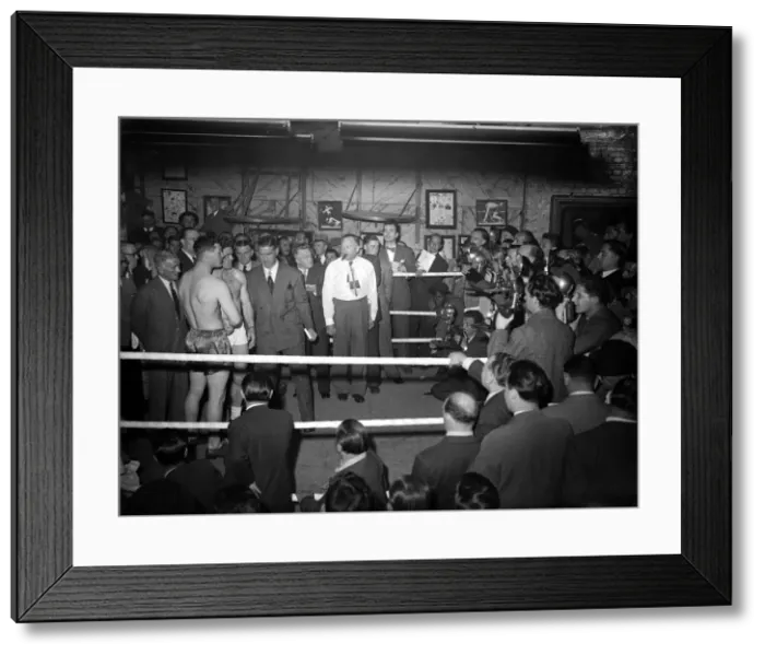 Framed Print : Freddie Mills puts on a show for the cameras at the weigh-in for the his fight with Bruce Framed Print : Freddie Mills puts on a show for the cameras at the weigh-in for the his fight with Bruce