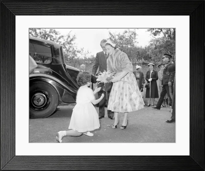 Framed Print : Princess Margaret seen being presented with a bouquet at the start of her visit to Framed Print : Princess Margaret seen being presented with a bouquet at the start of her visit to