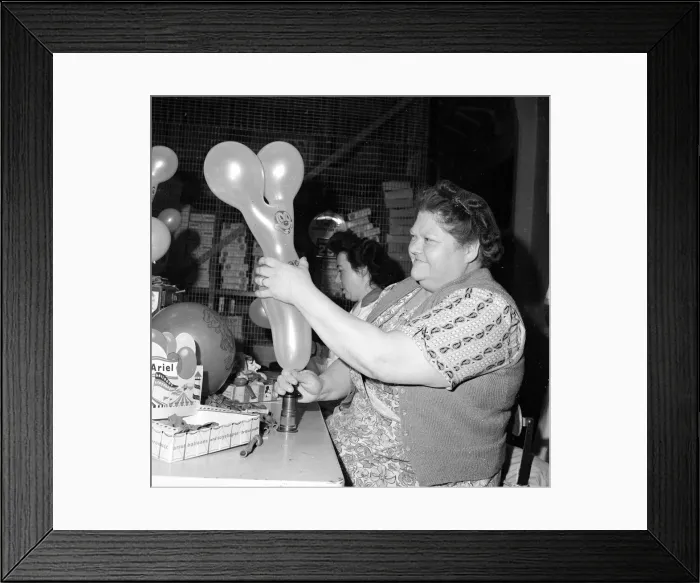 Framed Print : Louise German carries out quality control on Ariel Christmas Balloons December 1953 Framed Print : Louise German carries out quality control on Ariel Christmas Balloons December 1953