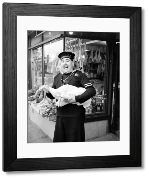 Framed Print : HM Submariner Bill Hayne enjoys collects the turkey for christmas dinner whilst on a
