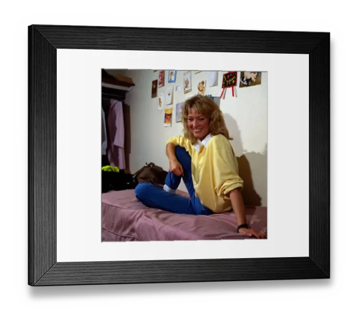 Framed Print : Gillian Taylforth sitting on bed November 1987