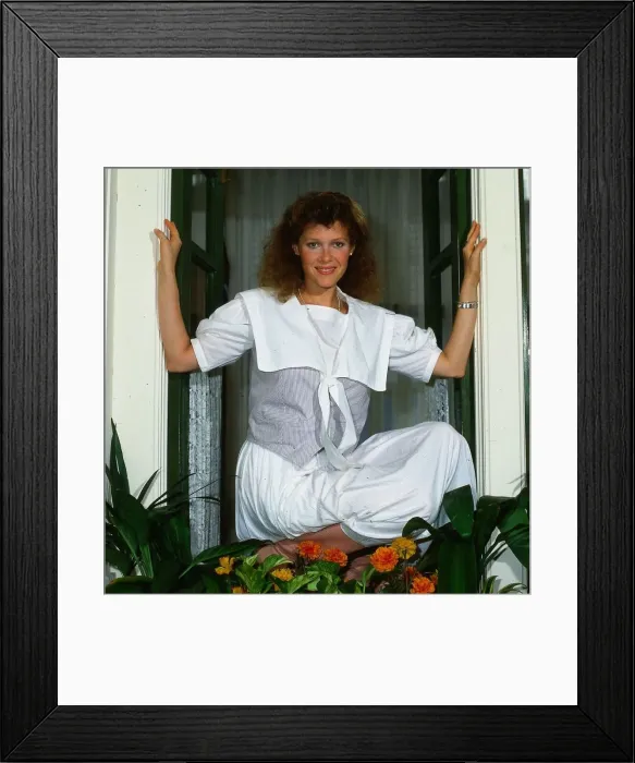 Framed Print : Kate Capshaw sitting at window June 1984 Framed Print : Kate Capshaw sitting at window June 1984