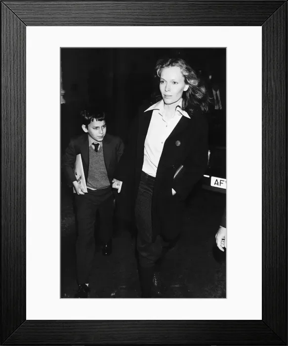 Framed Print : Mia Farrow Actress with one of her sons 1983 Framed Print : Mia Farrow Actress with one of her sons 1983